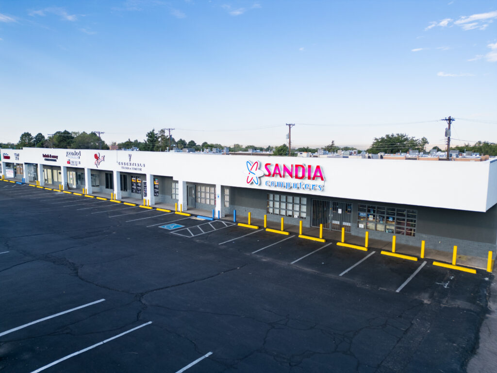 Image of a strip mall with Sandia for empowering growth